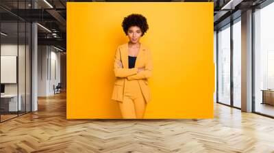 Portrait of her she nice-looking attractive charming pretty calm content wavy-haired girl folded arms summer clothing trend isolated over bright vivid shine vibrant yellow color background Wall mural