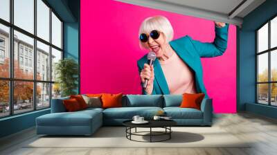 Portrait of her she nice-looking attractive lovely cheerful gray-haired lady singing cool hit spending weekend isolated on bright vivid shine vibrant pink fuchsia color background Wall mural