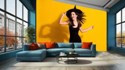 Portrait of her she nice-looking attractive pretty lovely slender thin cheerful glad chic lady wizard dancing having fun vogue lifestyle isolated bright vivid shine vibrant yellow color background Wall mural