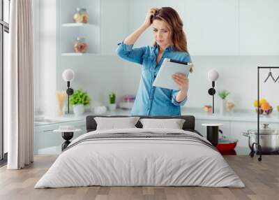 Portrait of her she nice lovely attractive confused brown-haired lady thinking how to prepare fresh hot dish meal dinner lunch green eco delicacy in light white interior style kitchen Wall mural