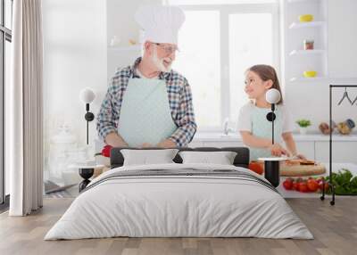 Portrait of his he her she nice cheerful lovely grey-haired granddad grandchild cooking fresh domestic delicious dish dinner naples pizza cookery culinary in modern light white interior kitchen house Wall mural