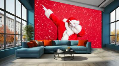 Portrait of his he nice attractive careless bearded Santa having fun leisure fairy eve noel fest celebratory wintertime isolated over bright vivid shine red background Wall mural