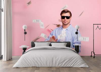 Portrait of his he nice cool trendy content attractive handsome candid guy wearing checked shirt throwing money flying in air party wealth isolated over pink pastel background Wall mural