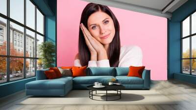 Portrait of young beautiful happy smiling cheerful pretty lovely girl daydreaming isolated on pink color background Wall mural