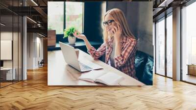 portrait of young smiling businesswoman calling her best friend, having break, telling something fun Wall mural