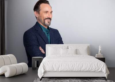 Profile side view portrait of his he nice attractive cheerful cheery middle age man in old-fashioned formalwear suit folded arms isolated over light white gray pastel color background Wall mural