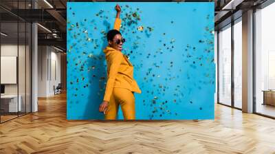 Rear behind portrait of funny positive person enjoy corporate disco isolated on blue color background Wall mural