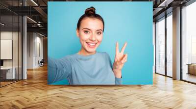 Self-portrait of her she nice-looking attractive winsome sweet lovable lovely cheerful cheery optimistic girl showing v-sign isolated over bright vivid shine turquoise background Wall mural