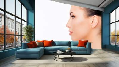 Side view portrait of beautiful woman isolated on white backgrou Wall mural