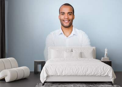 successful smiling young handsome american guy lawyer in formal outfit on pure background with cross Wall mural