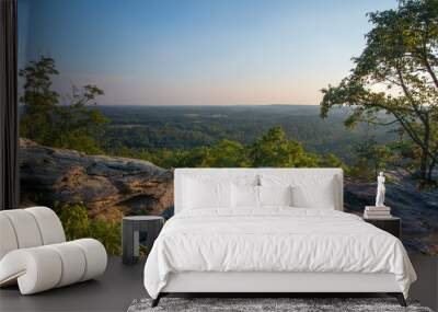 Shawnee national forest seen from a rocky precipice bathed in golden sunlight Wall mural