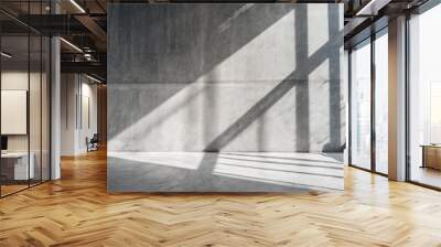 Concrete background with a window letting in natural light. Wide, blank concrete wall and floor. Wall mural