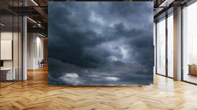 Bad or moody weather sky and environment. carbon dioxide emissions, greenhouse effect, global warming, climate change. The dark sky with heavy clouds converging and a violent storm before the rain. Wall mural