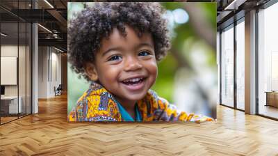 cute happy young black boy with curly hair in park Wall mural