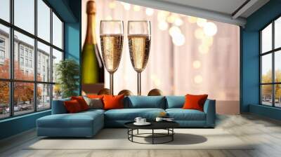 two champagne glasses on a table Wall mural