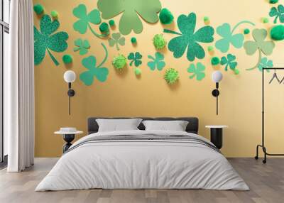 St. Patrick Day themed gold background with shamrock clover of various sizes and shades of green. Wall mural