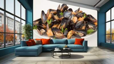 big group steamed fresh mussels on white plate Wall mural