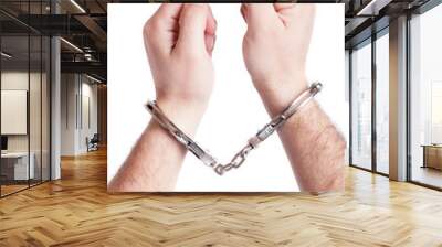 closeup of the hands of a man with handcuffs Wall mural