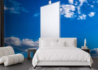 Blank vertical banner mockup against blue sky Wall mural