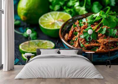 Bowl of barbacoa and coriander leaves on top of it Wall mural