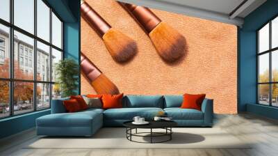 Three close-up makeup brushes Wall mural