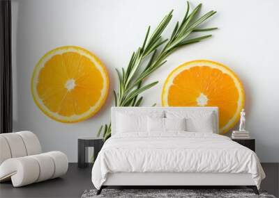 Two Orange Slices and a Sprig of Rosemary on White Background Wall mural