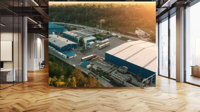 Aerial view of warehouse storages or industrial factory or logistics center from above. Aerial view of industrial buildings at sunset Wall mural