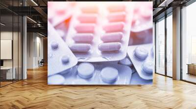 Different medicines: tablets, pills in blister pack, medications drugs, macro, selective focus, copy space, blue toned Wall mural