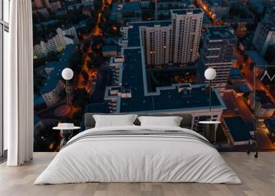 Flight above Night City buildings on drone, aerial view Wall mural