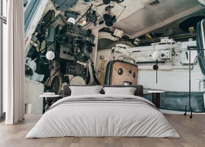 Inside military combat vehicle, gunner's seat with seat and instruments Wall mural