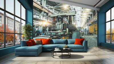 Interior of big industrial metalworking factory building with steel machinery, metallurgical plant. Wall mural