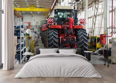 large factory building interior inside. production line of new modern agriculture machinery. Wall mural