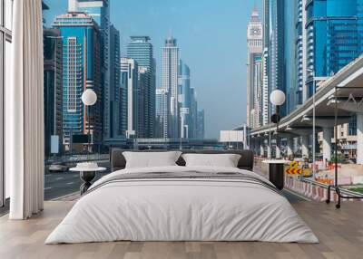 Sheikh Zayed Road in Dubai downtown with car traffic and high buildings. Wall mural