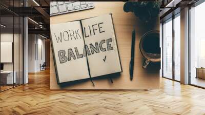 Work Life Balance - handwrite words in open notebook, pen, cup of coffee, top view. Lifestyle success strategy concept Wall mural