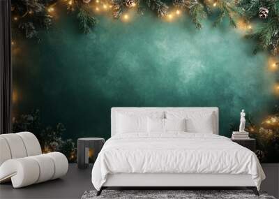 Glowing Christmas Garland Adorning Green Background with Twinkling Lights Wall mural