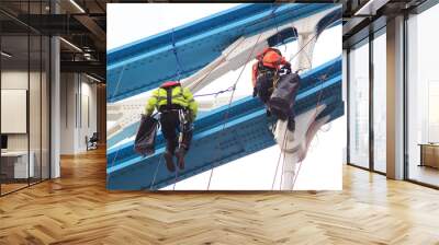 workers hanging from bridge Wall mural