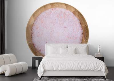 pink salt in a bamboo bowl on white background Wall mural