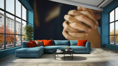 Christian life crisis prayer to god. Women Pray for god blessing to wishing have a better life. Hands praying to god with the bible. believe in goodness. Holding hands in prayer on a wooden table. Wall mural