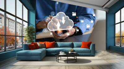 businessman uses a Laptop with technology cloud computing for data transmission, database, data storage, and backup. Networking and internet service concept. Futuristic business network concept.  Wall mural