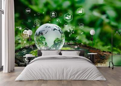 glass globe in green forest with the icon environment of esg, co2, circular company, and net zero.te Wall mural