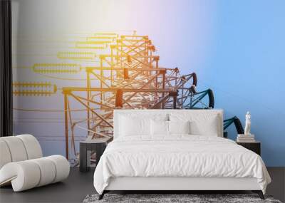 high voltage post.High-voltage tower sky sunset background. Wall mural