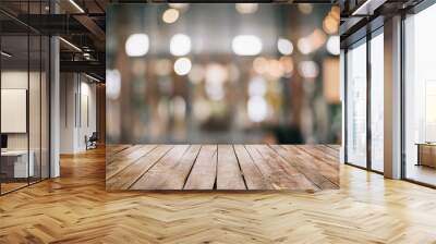 Empty wooden table top with lights bokeh on blur restaurant background. Wall mural