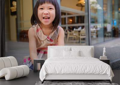 happy Asian child with modern city background Wall mural