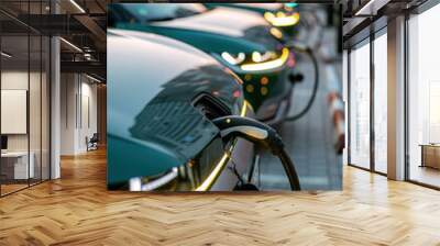 Cityscape with electric car charging stations, urban mobility solutions for electric vehicles. Wall mural