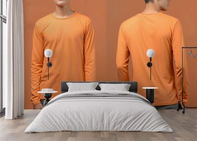 Man wearing a orange T-shirt with long sleeves. Front and back view Wall mural