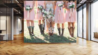 Bride and Bridesmaids wearing cowboy boots, blush pink bridal dresses, white and pink peonies bouquet, southern wedding style Wall mural