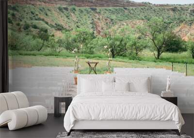 outdoor summer wedding ceremony, canyon desert wedding, white chairs Wall mural