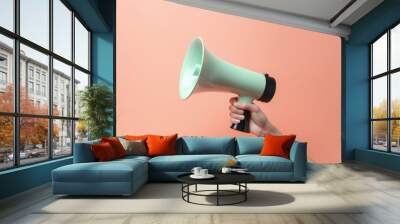 Hand holding megaphone on pink background, ads and sales concept. Generative AI Wall mural