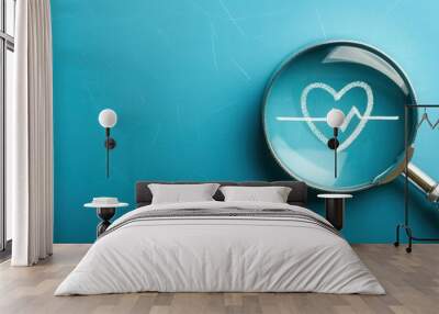 Magnifying glass with heart and graph with heartbeat, concept of health and medical care. Wall mural