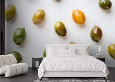 green olives scattered on a neutral background Wall mural